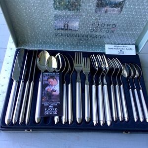 FJORD DESIGN - NORA STEEL FLATWARE. 20 piece place setting. New in box.